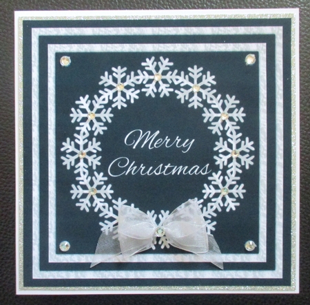 Black and Silver Snowflake Wreath by Davina Rundle
