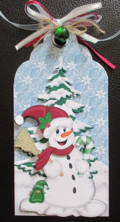 cute smiling snowman with christmas tree on a tag by Davina Rundle