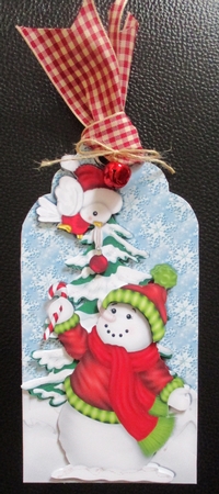 cute snowman with robin holding a bauble on a tag by Davina Rundle