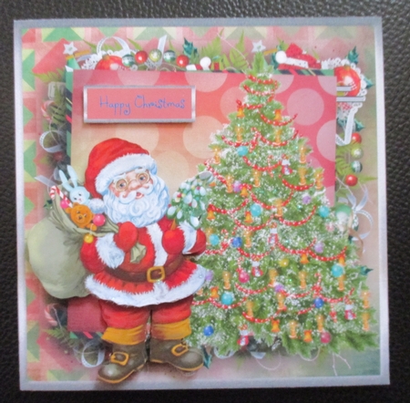 Santa and the Christmas tree by Davina Rundle