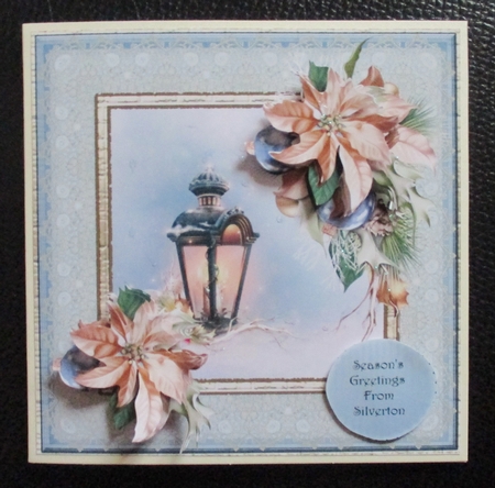 Lantern and Poinsettias by Davina Rundle