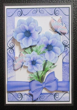 pretty purple flowers with bow and butterflies by Davina Rundle