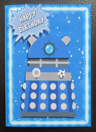 Blue Dalek, with stars in the sky A5 by Davina Rundle