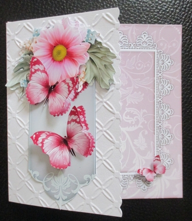 pretty pink flowers and butterflies on a plaque by Davina Rundle