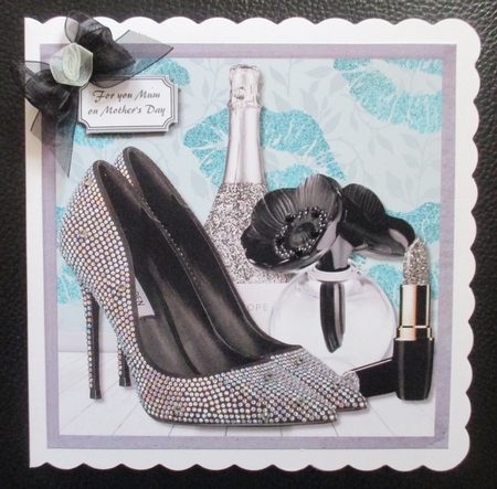 Black and silver accessories with turquoise background by Davina Rundle