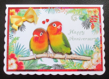 Pair of love birds on a branch in tropical flower frame by Davina Rundle