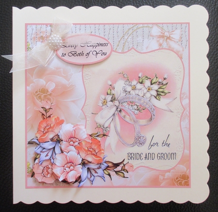 Peach Flowers & Wedding Rings by Davina Rundle