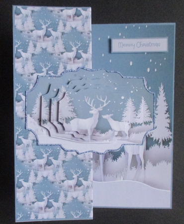 Reindeer in the woods by Davina Rundle