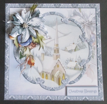 Blue poinsettia and church by Davina Rundle