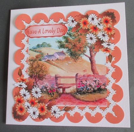 cottage wth garden and flowers in peach scalloped 8x8 frame by Davina Rundle