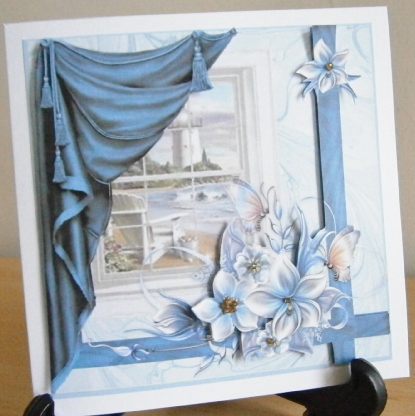 A View of the Sea with Blue and Silver Blooms 8x8 Topper by Davina Rundle