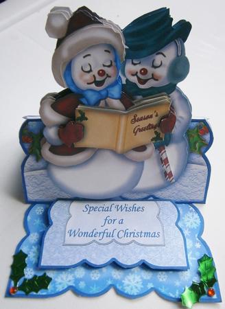 Singing Snow Couple Christmas Easel Card by Davina Rundle