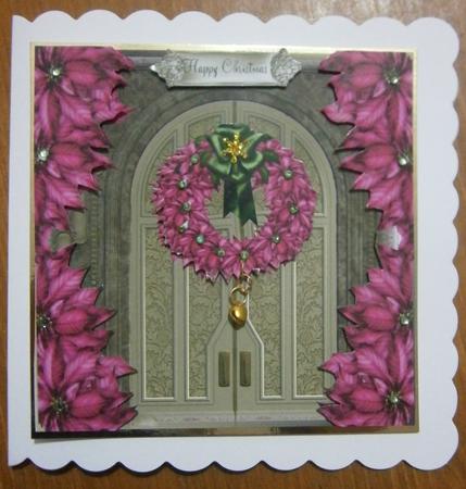 The Pink Poinsettia Wreath Door Topper by Davina Rundle
