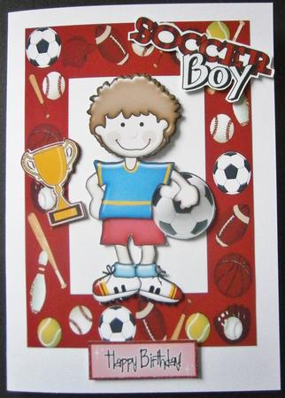 Soccer Boy Wins the Cup in Red Sports Frame by Davina Rundle