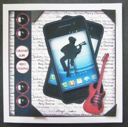 Smartphone with Teen Playing Guitar Qs by Davina Rundle