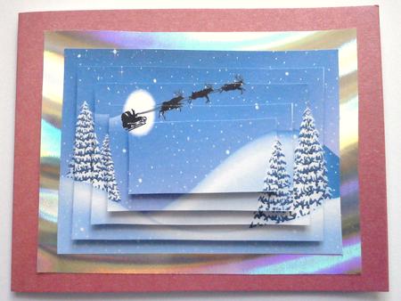 Santa in His Sleigh Pyramids by Dawn Jones