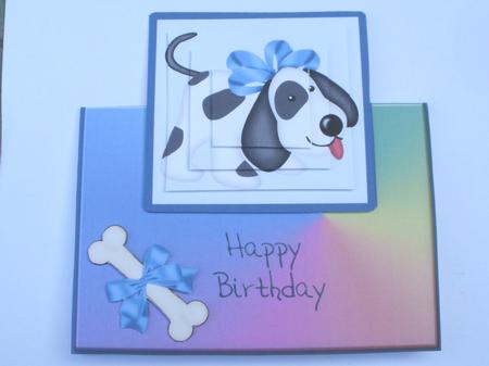 Puppy Dog Over the Edge - Happy Birthday by Dawn Jones