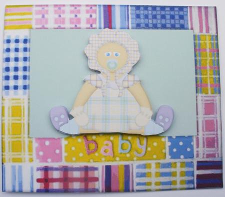 Baby Girl in Patchwork Frame by Dawn Jones
