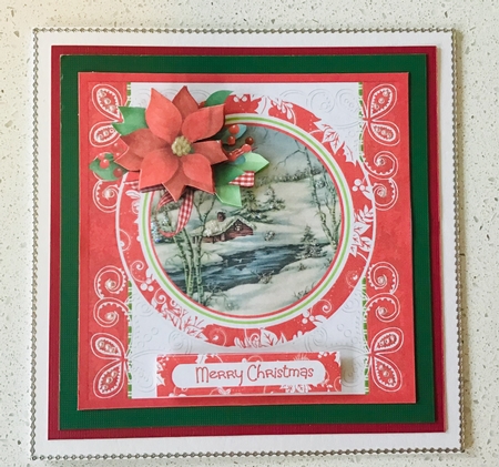 Winter scene and red poinsettia by Debbie Knechtel