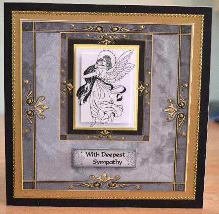 Angel Holding a Child Sympathy Qs by Debbie Knechtel