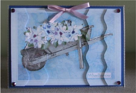 Flower Filled Wheelbarrow Wavey Edged Side Stacker by Debbie Knechtel
