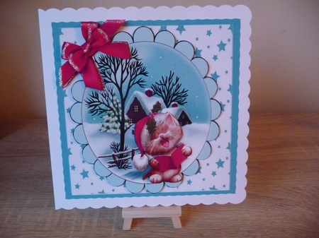lovely snow scene with cottage, stars and kitten pink bow 8x8 card front by Debbie Whyte