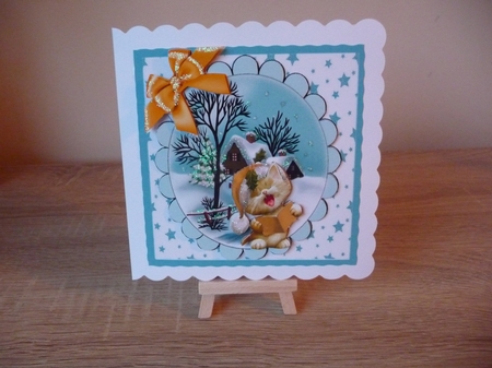lovely snow scene with cottage, stars and kitten gold bow 8x8 card front by Debbie Whyte