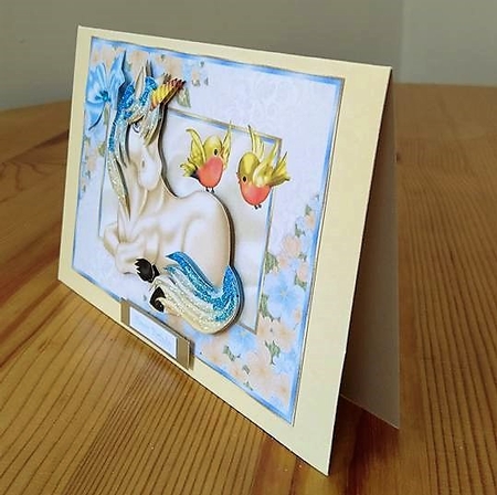 Little Unicorn with Love Birds in a Floral Frame by Debby Bloor