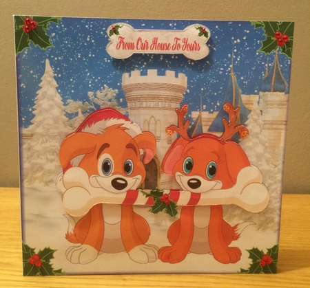 2 Cute Dogs Sharing Their Christmas Bone by Deborah McLuckie
