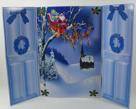 Lovely Christmas Gatefold of Santa on Sleigh Flying Through the Trees by Debbie Porter