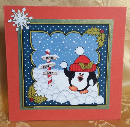 Christmas Pip Penguin has a snowball fight Fan Pyramage Topper by Deloraine Neubauer