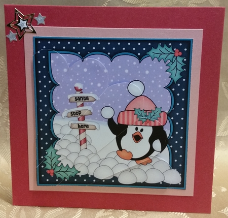 Christmas Pip Penguin has a snowball fight Fan Pyramage Topper by Deloraine Neubauer