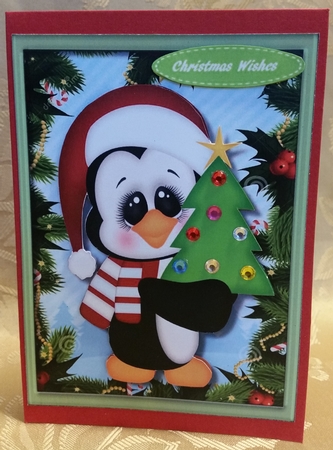 Penguin with the Christmas Tree  by Deloraine Neubauer