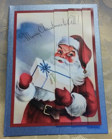 Santa Claus with Gift Side Stacker by Deloraine Neubauer