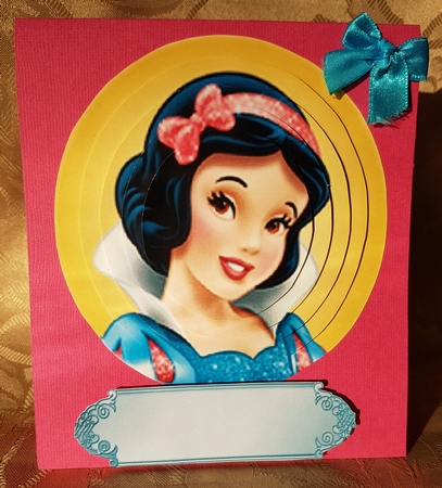 princess smile with blue bow oval pyramids by Deloraine Neubauer