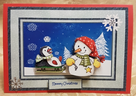 Snowman pulls the sledge for penguin by Deloraine Neubauer