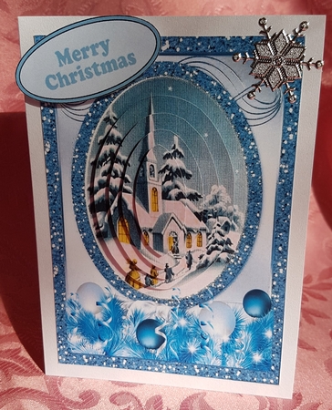 Going to the church on christmas in the snow oval pyramids (blue) A5 by Deloraine Neubauer