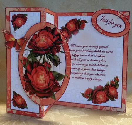 Fold Back Red and Orange Roses with Verse by Deloraine Neubauer