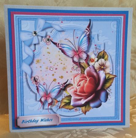 Beautiful Twikle Roses and Flutterby's by Deloraine Neubauer