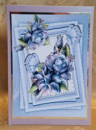 Pretty Blue Roses and Butterflies on Lace A4 by Deloraine Neubauer
