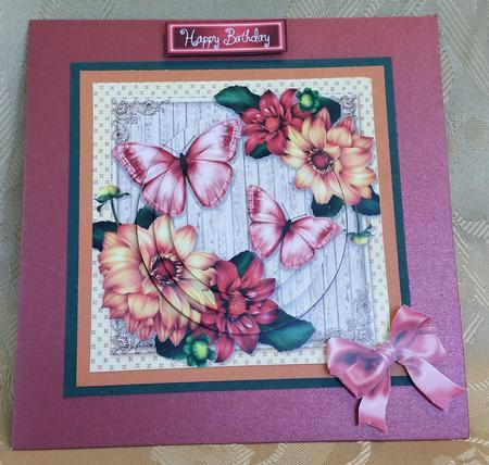 Beautiful Orange Flowers with Butterflies Pyramid by Deloraine Neubauer