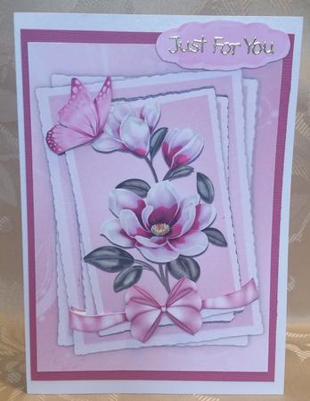 Pretty Lilac Magnolias, with Butterfly and Bow in Lace Fram by Deloraine Neubauer