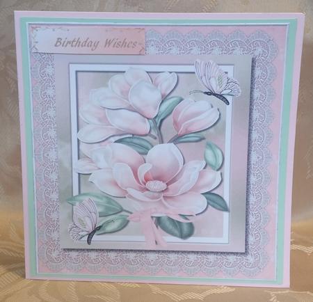 Lovely Soft Pink Magnolias on Lace  by Deloraine Neubauer