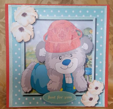 Elije Bear Relaxing in the Garden by Deloraine Neubauer