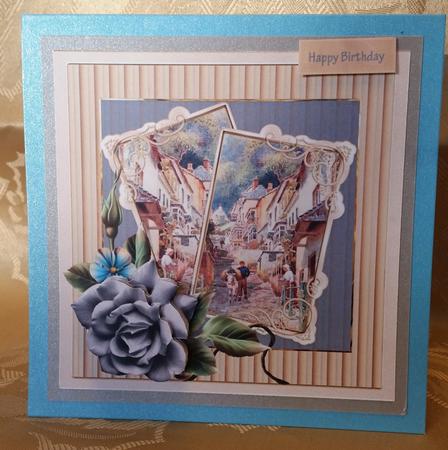 Clovelly and a Blue Rose 7.5 Card by Deloraine Neubauer