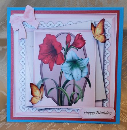 Beautiful Ameryllis and Gold Butterfly's by Deloraine Neubauer