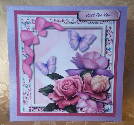 Lovely Roses and Lilac Butterfly's by Deloraine Neubauer