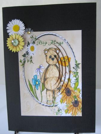 Big Hugs Teddy Bear with Flowers by Denise Lada