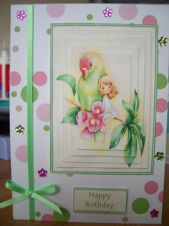 Darling Little Flower Girl with Beautiful Bird by Denise MacLachlan