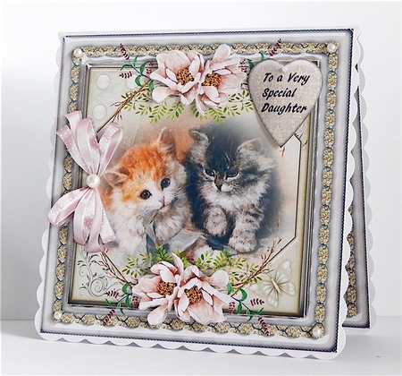 Cats and pink flowers by Denise Murray